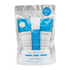 Daily Essentials Kit  with blue and white tubes of shave formula, daily moisturizer and face scrub in a silver pouch